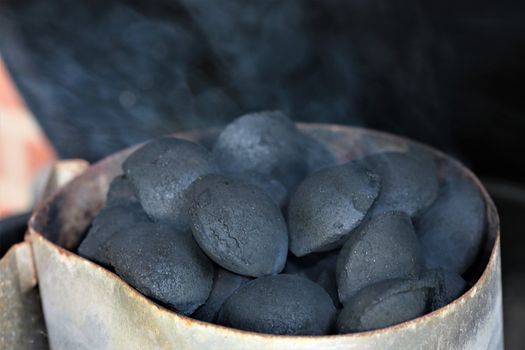 Coal briquettes in the ignition fireplace