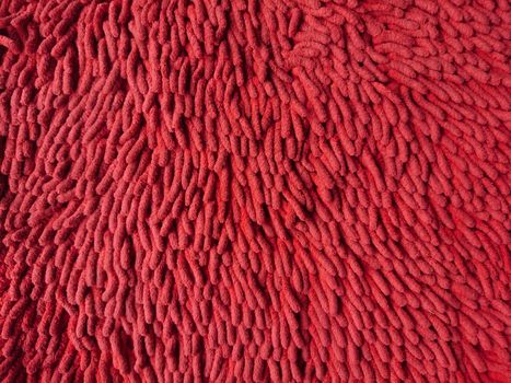 Detail of red fabric carpet for background