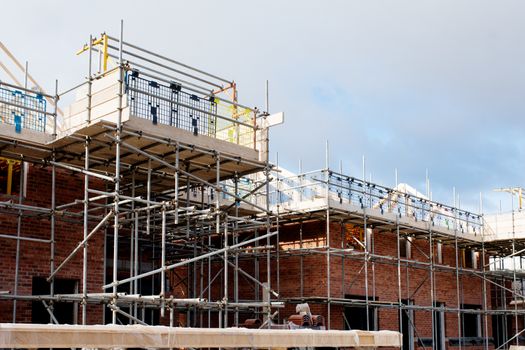 Loading platform made of scaffold system on housing development construction site