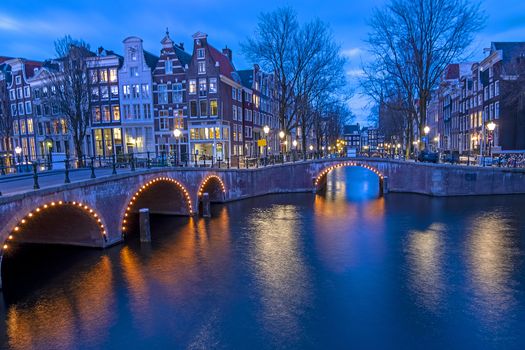 City scenic from Amsterdam at the Keizersgracht in the Netherlands at sunset