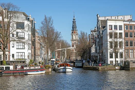 City scenic from Amsterdam with the South church in the Netherlands