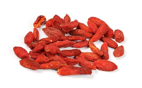 Closeup photo of goji berry wolfberry - Lycium chinense dried fruits isolated on white background.