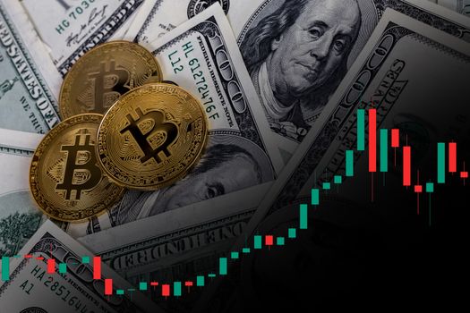 golden bitcoin shiners over paper us dollar banknotes with stock charts.