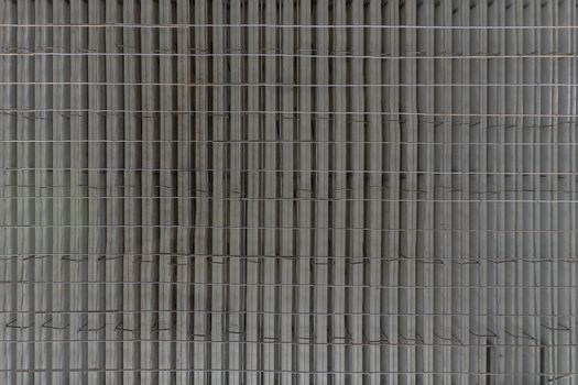 Large flat profiled sheet armature reinfoced floor before concrete fill. Flat rectangular texture.