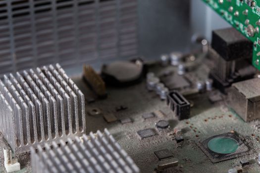 dusty pc electronic hardware closeup with selective focus and blur.