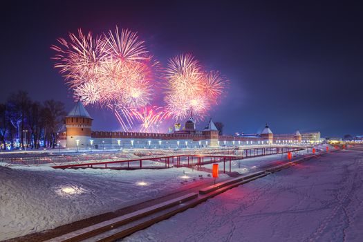 Winter night fireworks over kremlin and Upa quay in Tula, Russia at 2019.