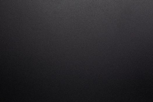 abstract black and white photo texture background of grainy powder coating surface.