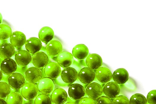proton purple spherical ball capsules with selective focus isolated on white background.