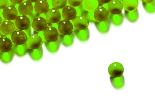 proton purple spherical ball capsules with selective focus isolated on white background.