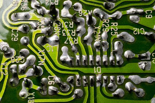 back side of old flat textolite pcb without components with selective focus