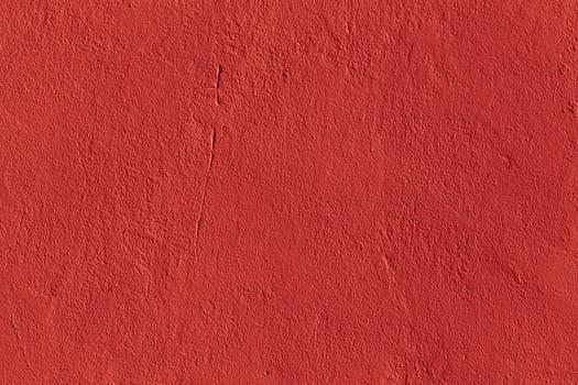 flat live coral color plaster wall matte texture.