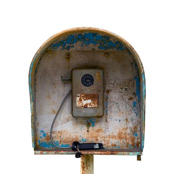 Old public russian wired urban telephone post - useless abandoned and broken. Isolated on white background.