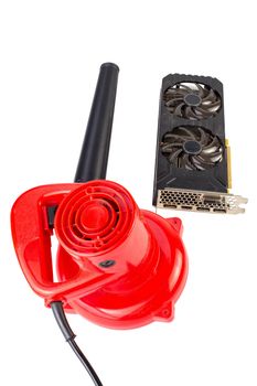 Electrical air blower and dusty pc video card isolated on white background.