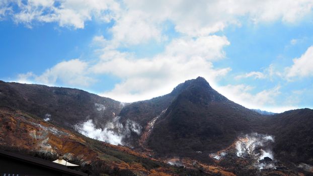 Hill and clear blue sky and white clouds and outdoor nature landscape.