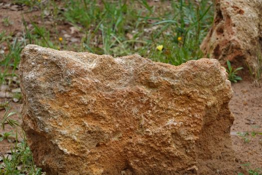 a brown rock in a High quality Photo.