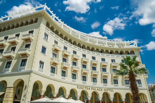 Day view of luxurious five-star hotel at Aristotelous main square on a sunny day.