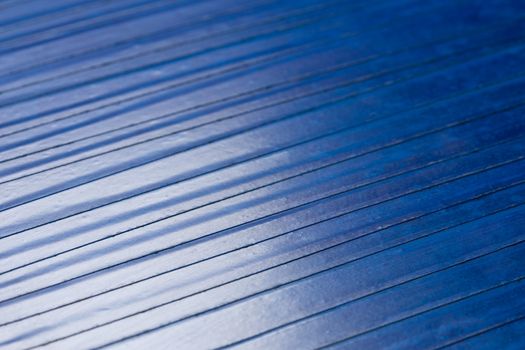 old blue pvc duct tape flat background with selective focus and shallow depth of field and natural optical blur