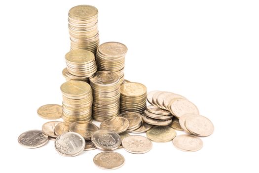 Russian rubl coin stacks group with small pile under it isolated on white background. Edge to edge sharpness.