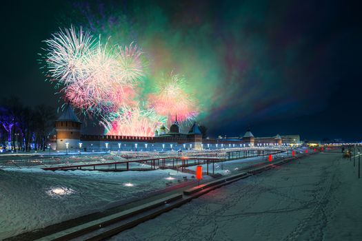 Winter night fireworks over kremlin and Upa quay in Tula, Russia at 2019.
