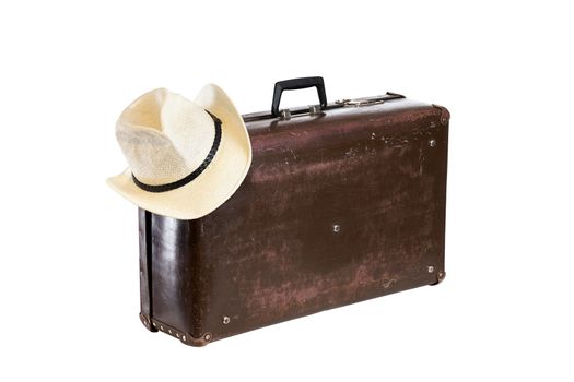 old brown fiber suitcase with hat isolated on white background.