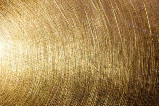 flat brushed brass texture with random pattern and light reflection