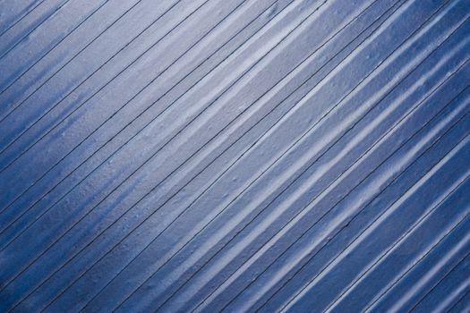 old blue pvc duct tape flat background with light reflection