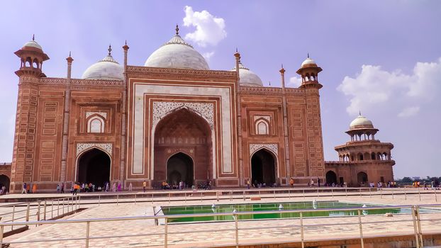 Grand imperial sandstone Persian style domed mausoleum Humayun Tomb in the landscaped char-bagh garden. A finest example of Mughal architecture and iconic structures. New Delhi India May 2019