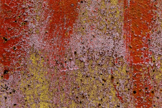 iron sheet with old red over white over green paint and lichen.