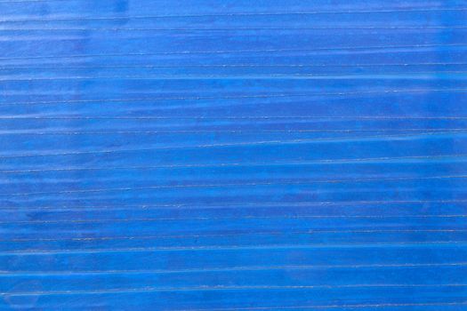 Flat texture and background of old blue pvc duct tape