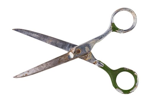 Single old soviet dirty used scissors isolated on white background. Opened.