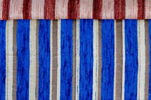 striped synthetic woven upholstery fabric close-up texture and background