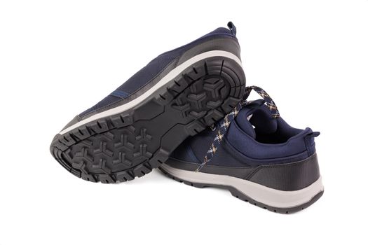 black and blue outdoor empty lightweight waterproof breathable fabric sneakers isolated on white background.