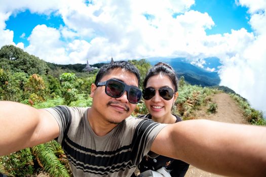 Couole love  selfie in Highest mountain at Thailand