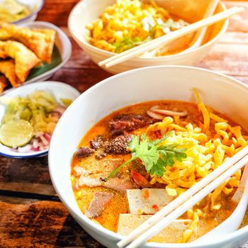 Northern Thai  Curried noodle soup (Khao soi) with chicken meat and spicy coconut milk 