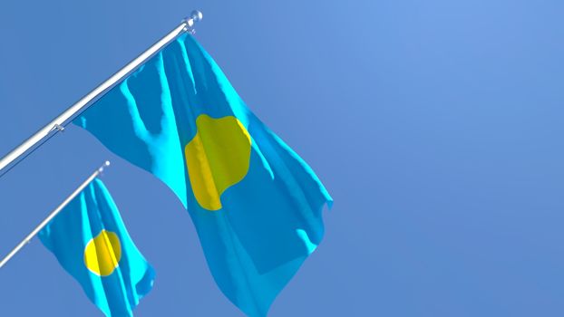 3D rendering of the national flag of Palau waving in the wind against a blue sky