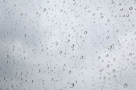 Drops of rain on the window, shallow dof