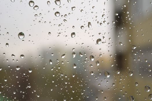 Drops of rain on the window, shallow dof