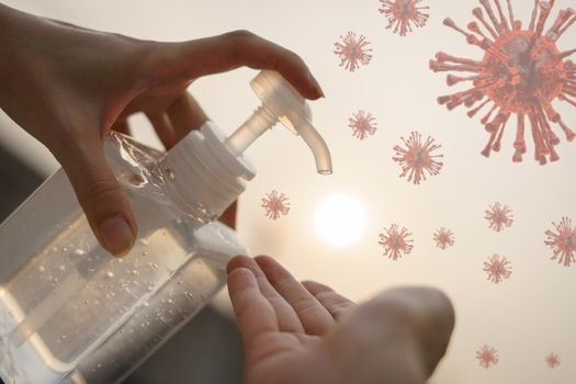 Woman washing hands with alcohol gel or sanitizer gel. corona virus or Covid-19 protection.