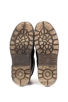 Sole bottom of a pair workboots with acid and oil resistance ability. Isolated on white background