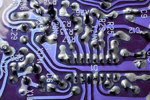 back side of old flat textolite pcb without components with selective focus