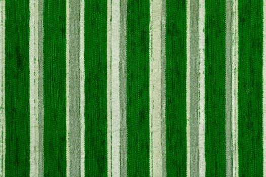 green striped synthetic woven upholstery fabric close-up texture and background