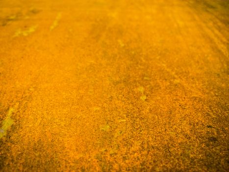 flat heavy rusted sheet of metal selective focus background