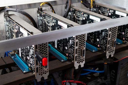 stopped domestic gpu cryptocurrency mining rig under layer of dust with selective focus