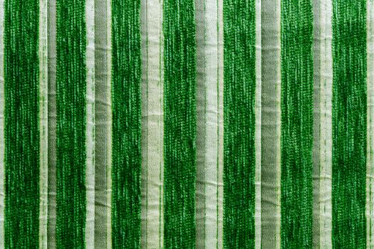 green striped synthetic woven upholstery fabric close-up texture and background