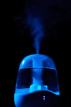 Aroma oil diffuser or air humidifier, increase in air humidity indoors.