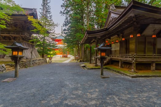 Sunset view of the Danjo Garan Sacred Temple Complex, with lanterns, in Mount Koya (Koyasan), Japan