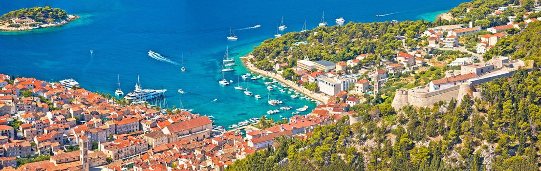 Hvar bay and yachting harbor aerial panoramic view, Dalmatia archipelago of Croatia