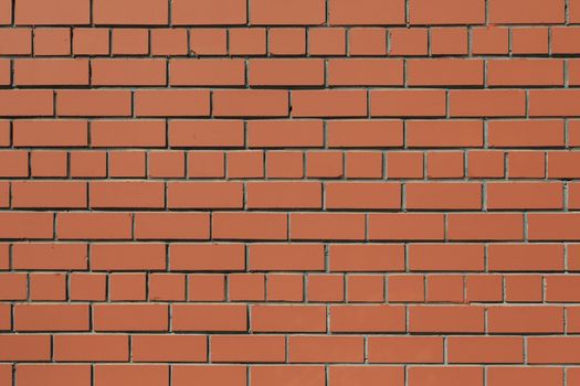 Front full-size view of a flat brown brick wall