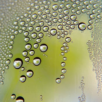 Drops of water on the crooked glass, shallow dof