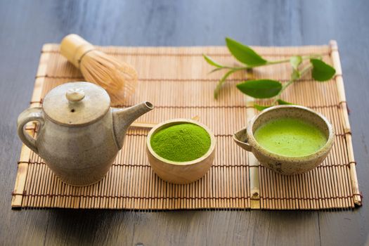 Set of matcha powder bowl wooden spoon and whisk green tea leaf Organic Green Matcha Tea ceremony.